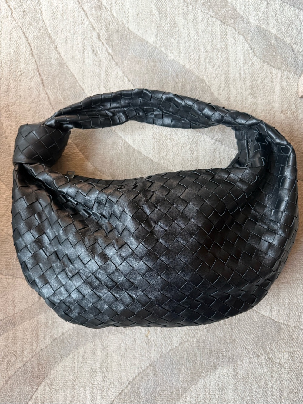 Woven leather handbag